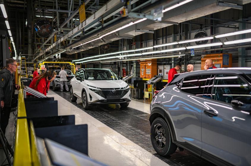 EV cars on the production line at Nissan